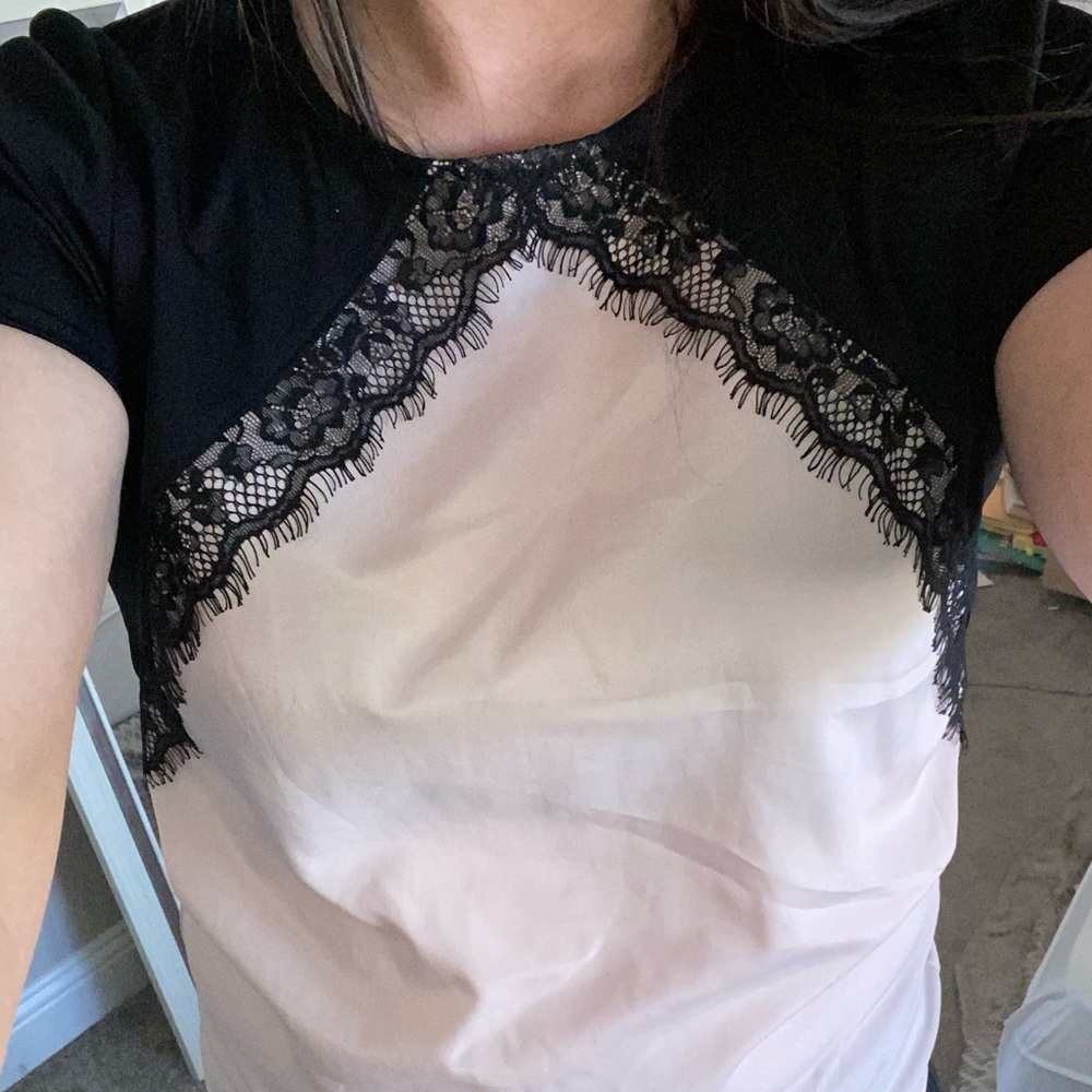 Women’s medium Silky Pink and black lace top.